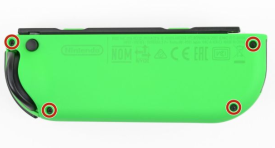 螺絲刀移除Joy-Con手柄背部的四顆Y型螺絲 螺絲刀移除Joy-Con手柄背部的四顆Y型螺絲